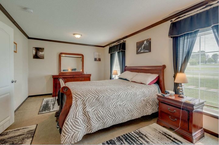 2800 Lock Hollow Road Dickson, TN 37055 - Photo 16 of 26 a bedroom with a bed and a night stand