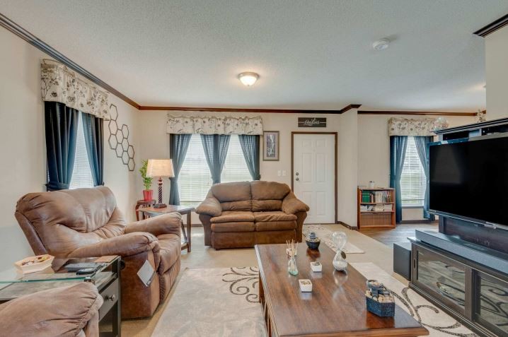 2800 Lock Hollow Road Dickson, TN 37055 - Photo 6 of 26 a living room with furniture and a flat screen tv