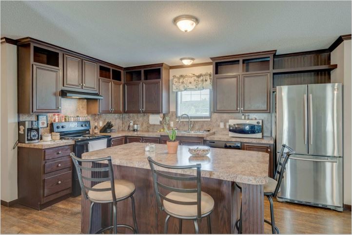 2800 Lock Hollow Road Dickson, TN 37055 - Photo 10 of 26 a kitchen with a refrigerator and a stove top oven