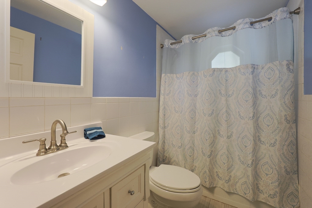 28 Forest Road Millis, MA 02054 - Photo 11 of 23 a bathroom with a sink toilet and shower