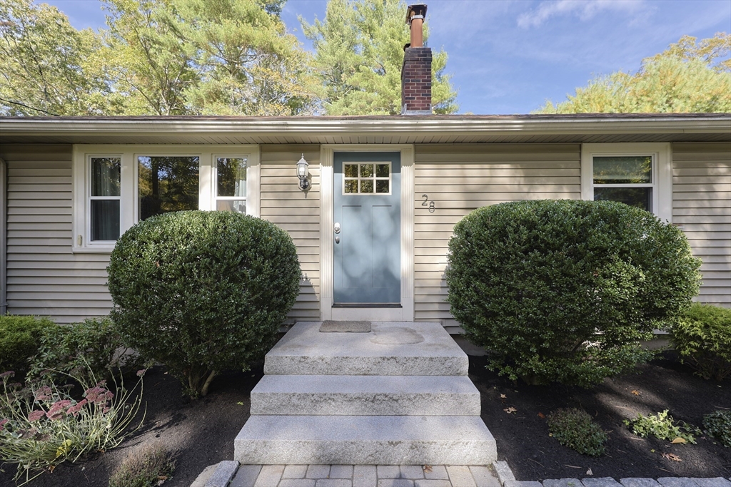 28 Forest Road Millis, MA 02054 - Photo 2 of 23 a front view of a house with garden