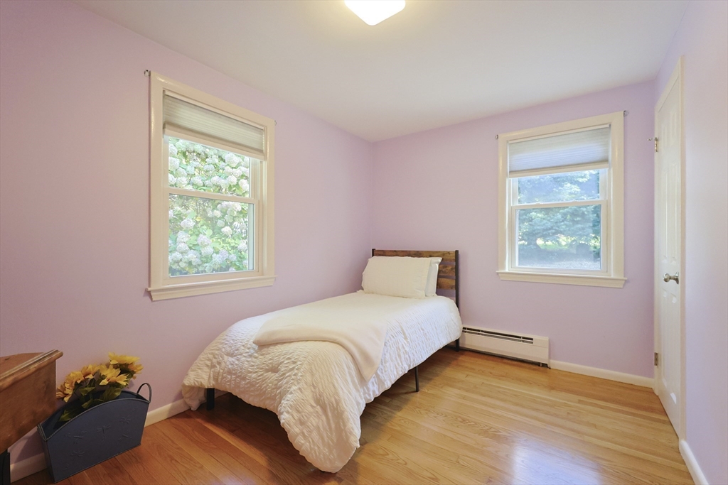 28 Forest Road Millis, MA 02054 - Photo 9 of 23 a bedroom with a bed and a window