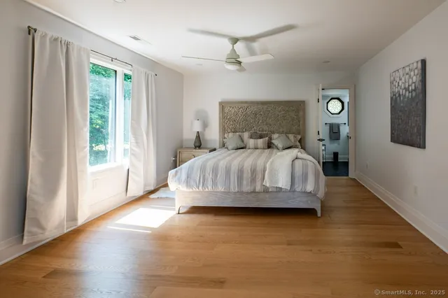 a bathroom with a sink a mirror and a shower