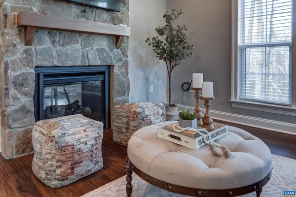 a view of a livingroom with furniture and window