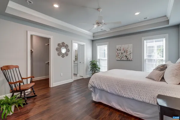 a bathroom with a shower sink and mirror
