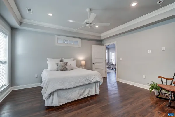 a bathroom with a shower and vanity