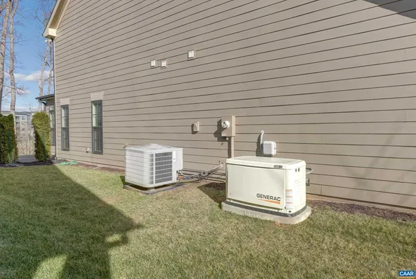 a view of house with garage