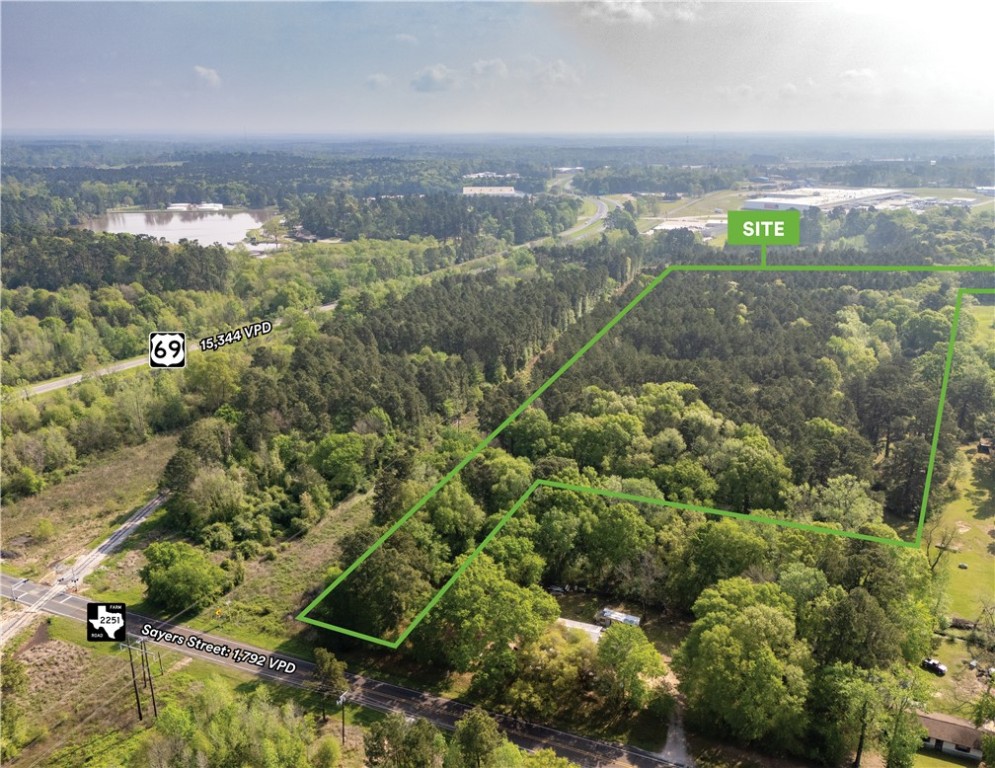 2101 Sayers Street Lufkin, TX 75904 - Photo 2 of 3 an aerial view of a residential houses with outdoor space and trees
