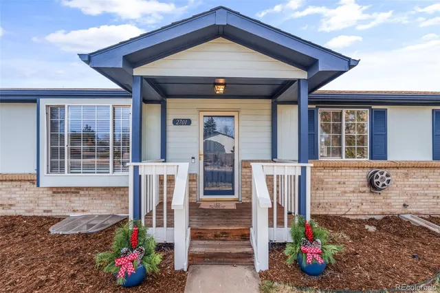 a front view of a house with a porch