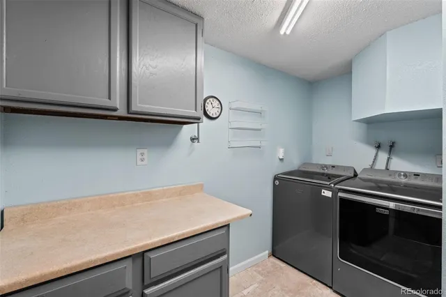 a kitchen with stainless steel appliances a stove and a refrigerator
