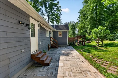 a view of a backyard with a garden