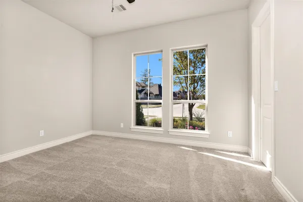 an empty room with windows