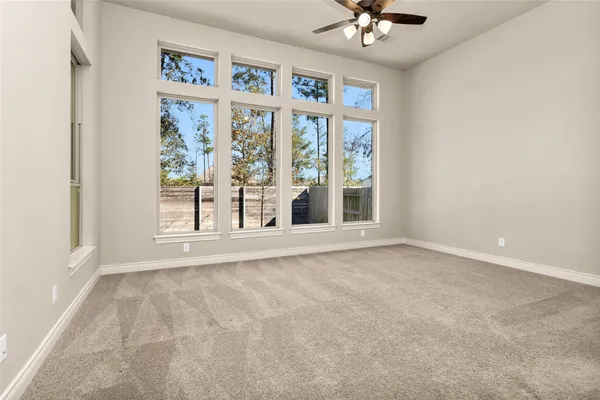 an empty room with windows