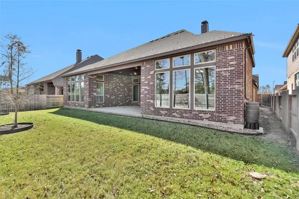 a view of a brick house with front door