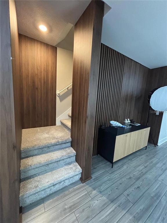 4812 Lime Rickey Alley Winter Garden, FL 34787 - Photo 7 of 19 a view of an empty room with wooden floor