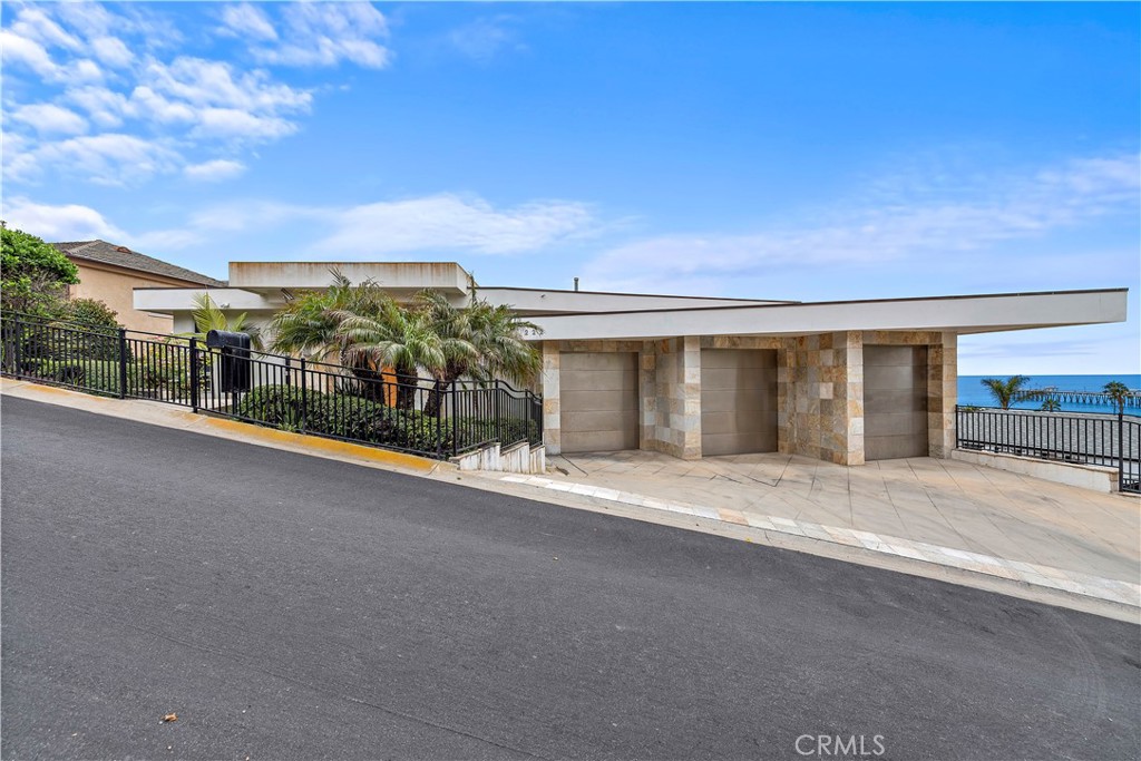 348 West Paseo De Cristobal San Clemente, CA 92672 - Photo 6 of 6 front view of a house with a road