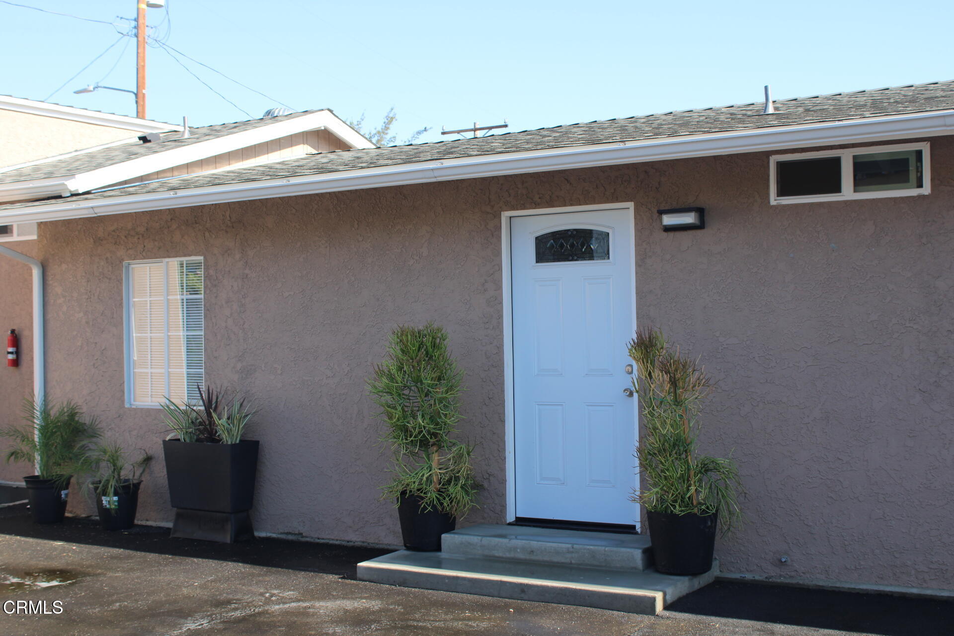 10031 Marcus Avenue Tujunga, CA 91042 - Photo 1 of 27 a front view of a house with plants
