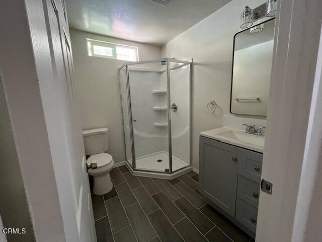 10031 Marcus Avenue Tujunga, CA 91042 - Photo 17 of 27 a bathroom with a double vanity sink toilet and shower