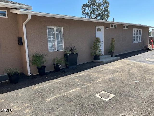 10031 Marcus Avenue Tujunga, CA 91042 - Photo 2 of 27 a view of a house with a backyard