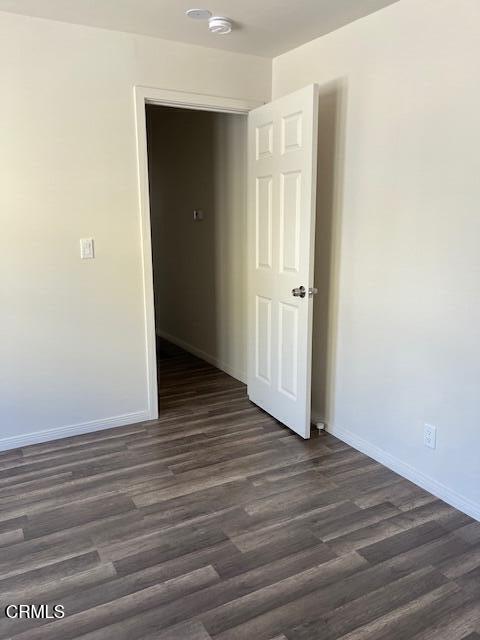 10031 Marcus Avenue Tujunga, CA 91042 - Photo 21 of 27 a view of an empty room with wooden floor