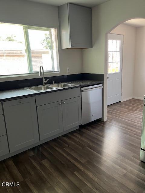 10031 Marcus Avenue Tujunga, CA 91042 - Photo 6 of 27 a kitchen with granite countertop a sink and a window