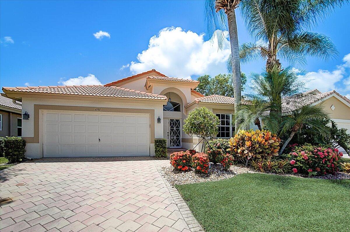 6581 Sun River Road Boynton Beach, FL 33437 - Photo 55 of 56 FRONT EXTERIOR
