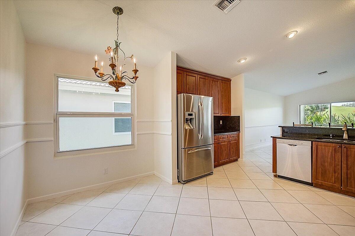 6581 Sun River Road Boynton Beach, FL 33437 - Photo 9 of 56 EAT IN KITCHEN