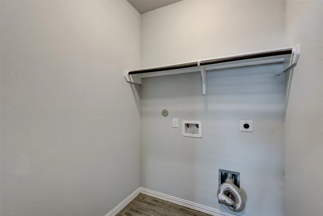 a bathroom with a sink a mirror and vanity