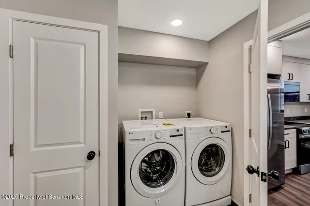 a utility room with dryer and washer
