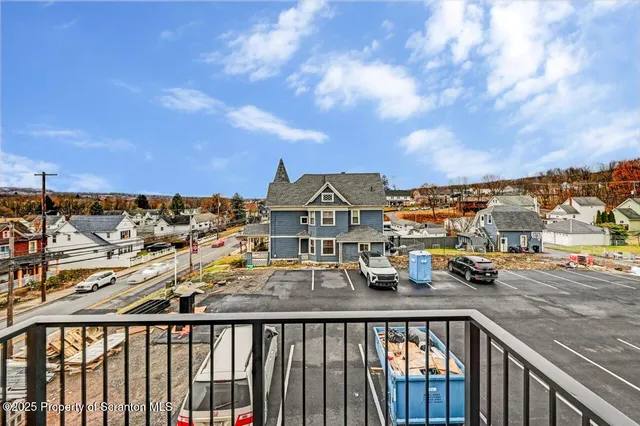 a view of city from a balcony