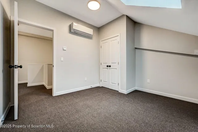 a view of a livingroom with wooden floor