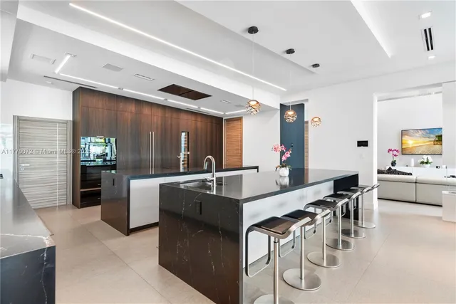 a bedroom with a bed and a potted plant