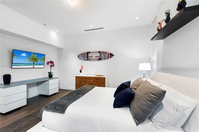 a bed room with a bed and a window