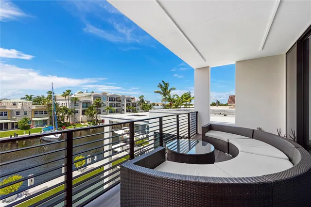 a bedroom with a bed and a lamp on table