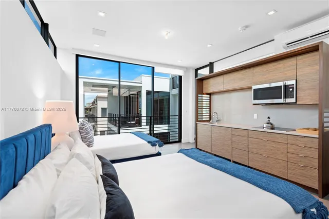 a room with gym equipment and a large window