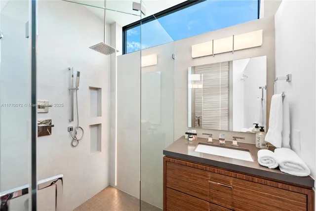 a dining area with furniture and city view