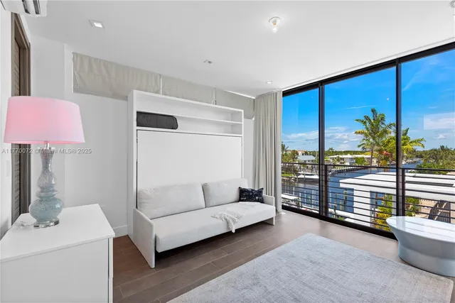 an aerial view of a house with a garden