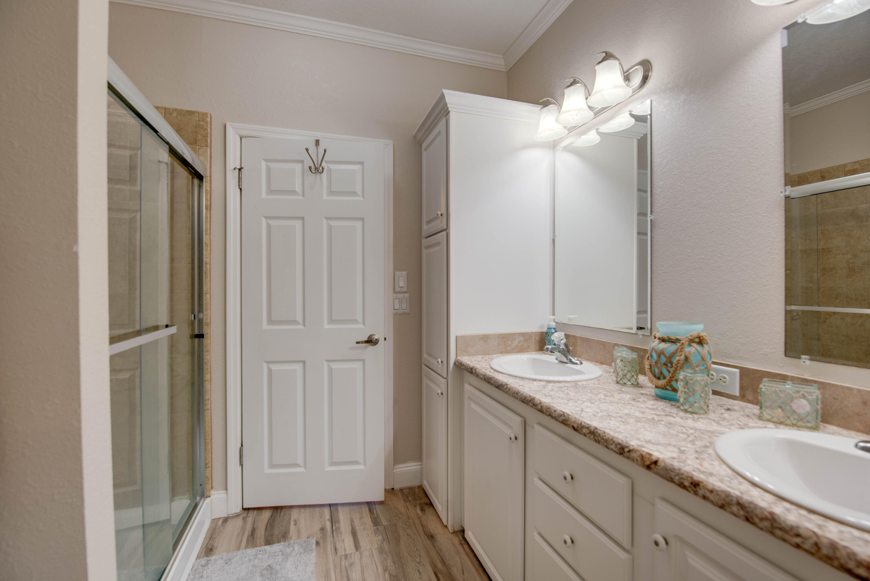 27373 Antigua Road Summerland Key, FL 33042 - Photo 13 of 31 a bathroom with a granite countertop sink and a mirror