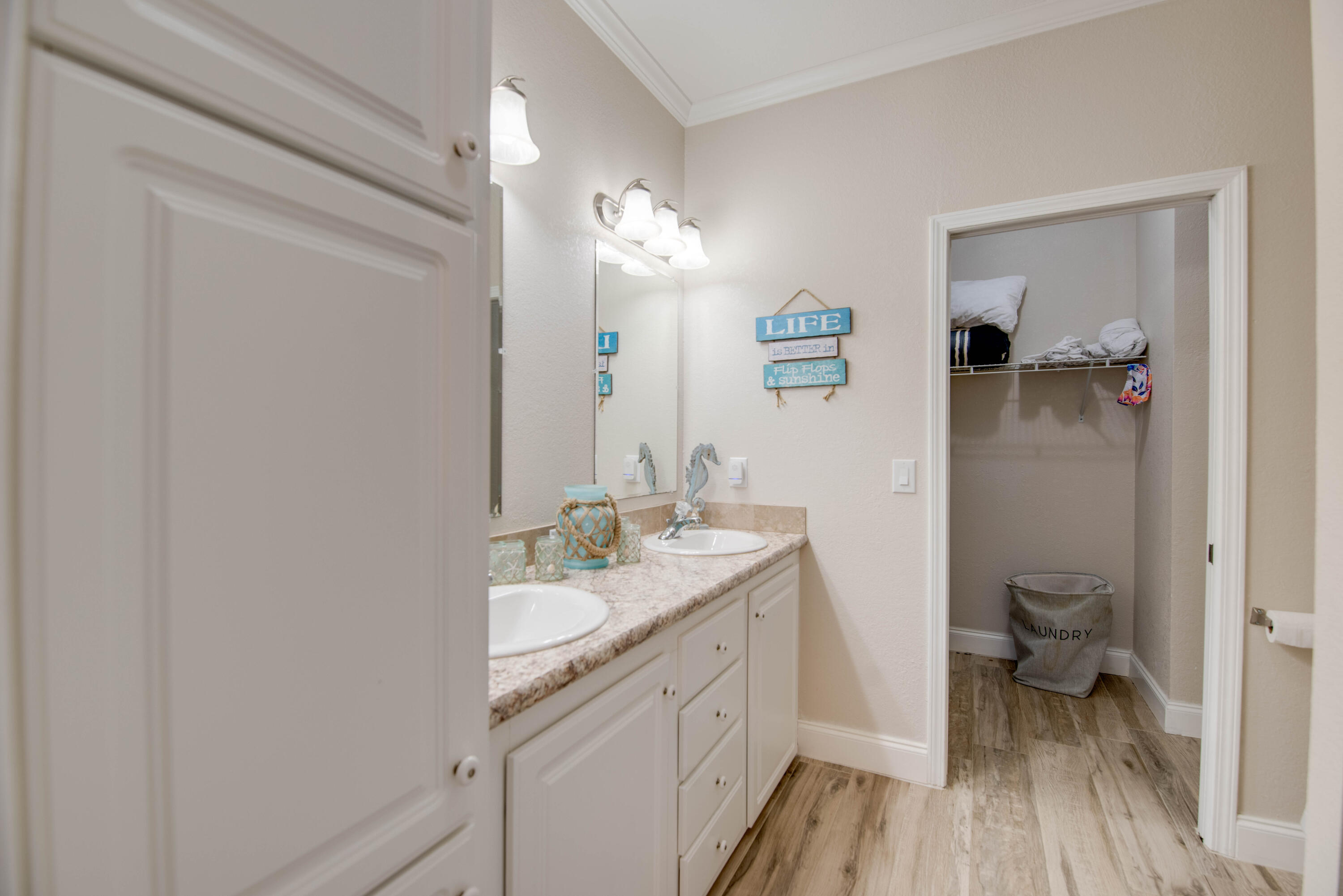 27373 Antigua Road Summerland Key, FL 33042 - Photo 14 of 31 a bathroom with a sink a toilet and a mirror