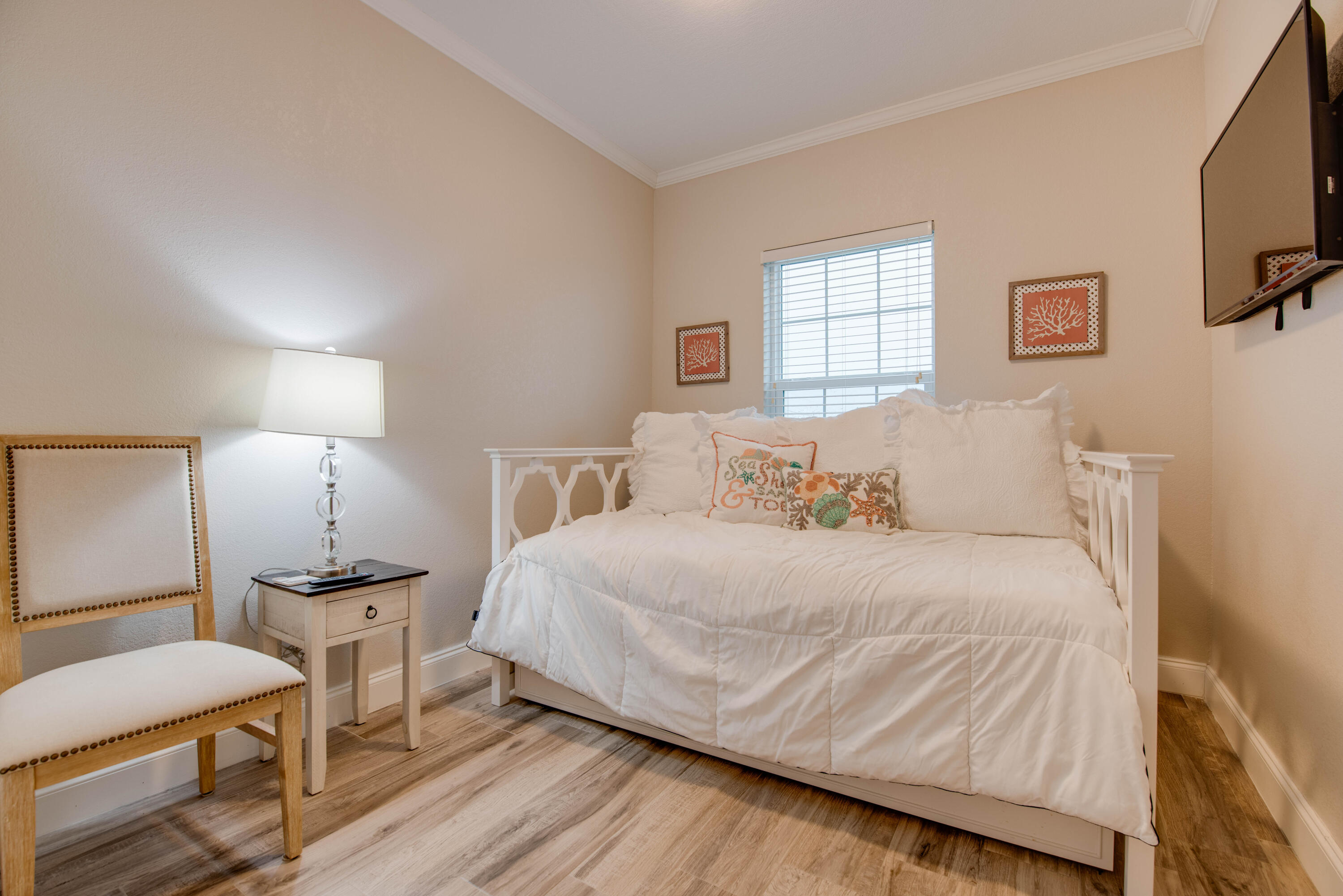 27373 Antigua Road Summerland Key, FL 33042 - Photo 18 of 31 a bedroom with a bed and a window