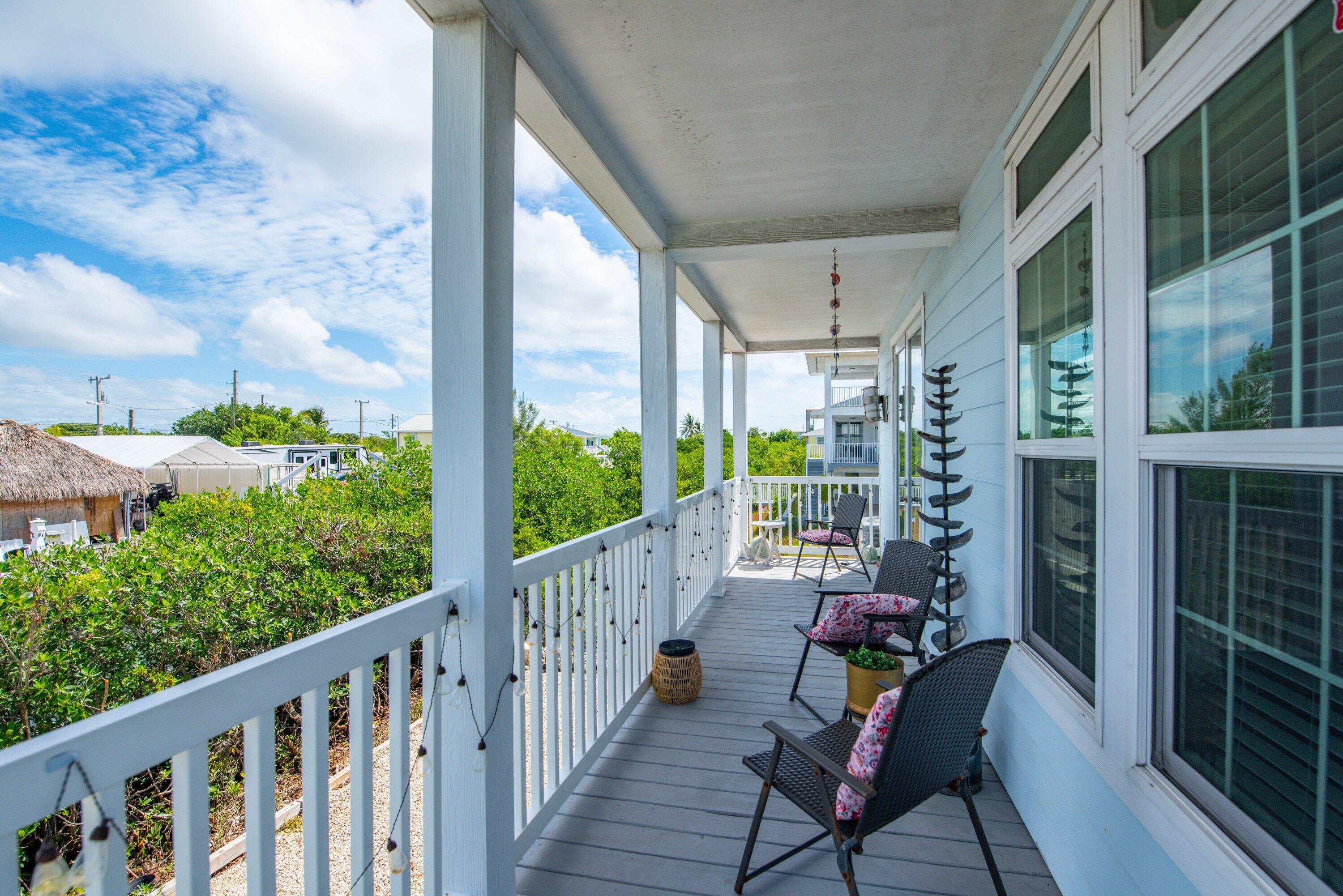 27373 Antigua Road Summerland Key, FL 33042 - Photo 20 of 31 a view of balcony with furniture