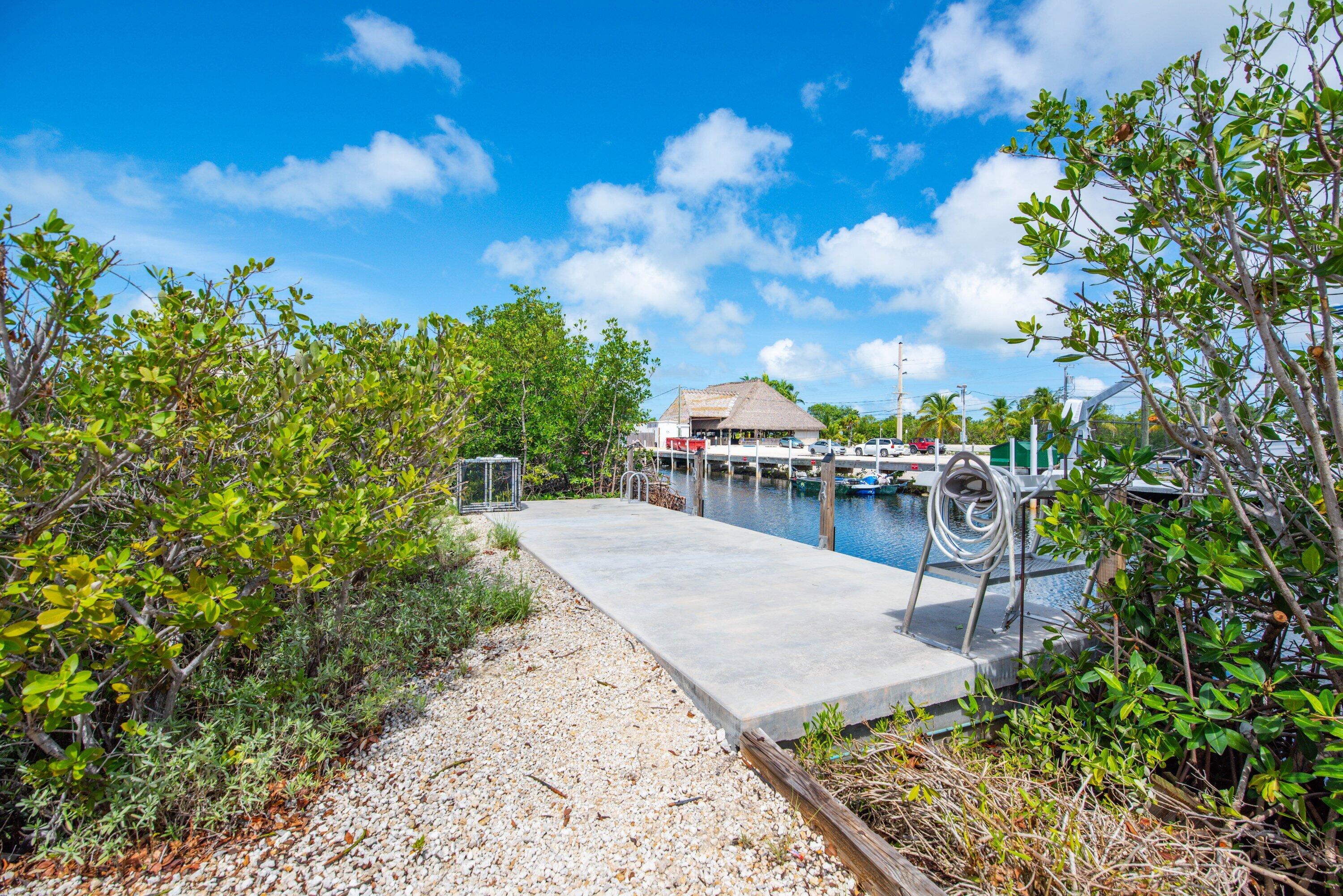 27373 Antigua Road Summerland Key, FL 33042 - Photo 25 of 31 a view of a terrace with sitting area