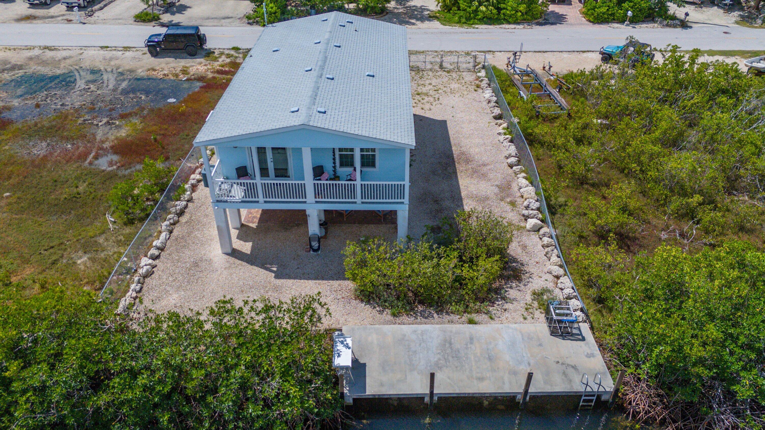 27373 Antigua Road Summerland Key, FL 33042 - Photo 27 of 31 an aerial view of a house with a yard