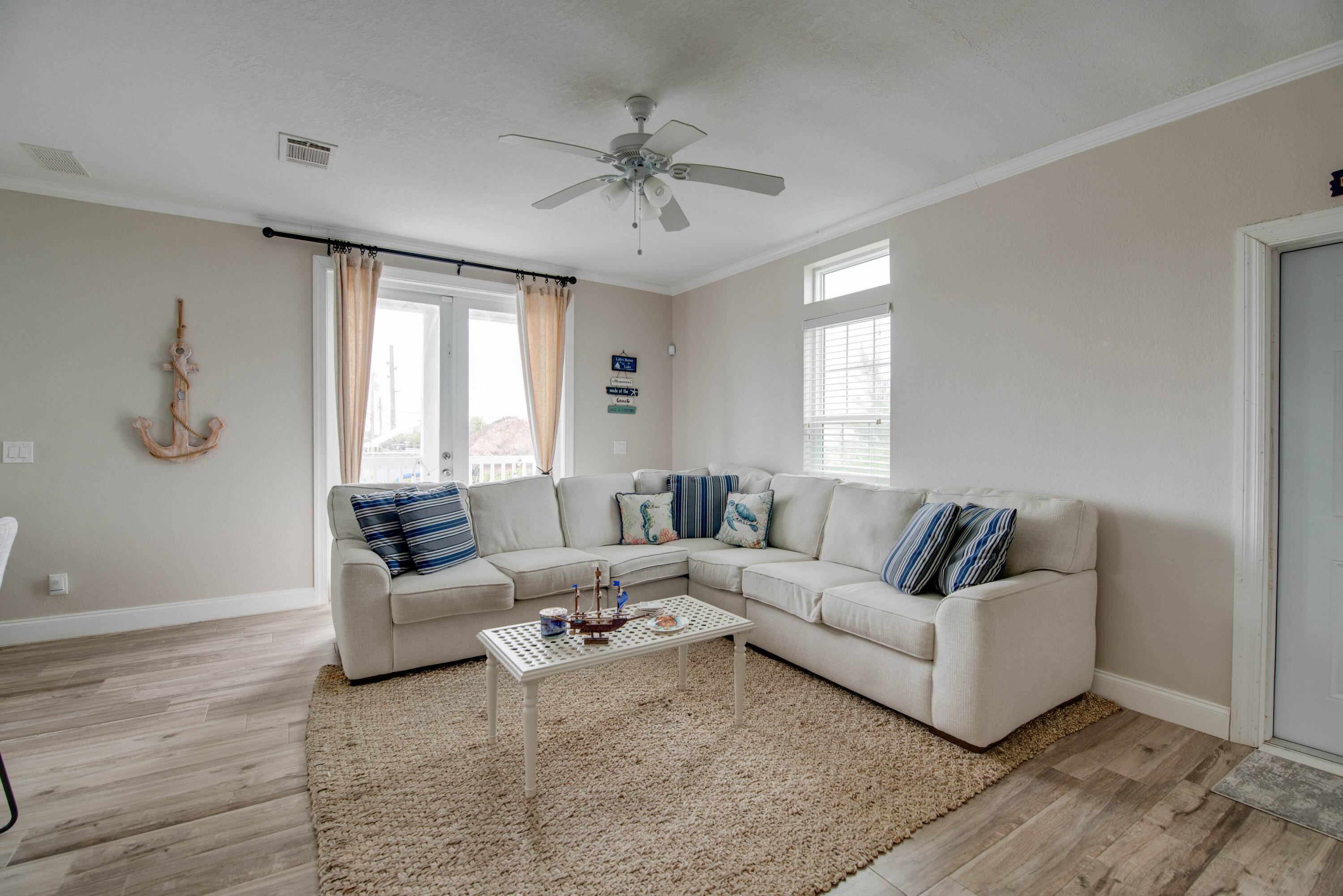 27373 Antigua Road Summerland Key, FL 33042 - Photo 6 of 31 a living room with furniture and a large window