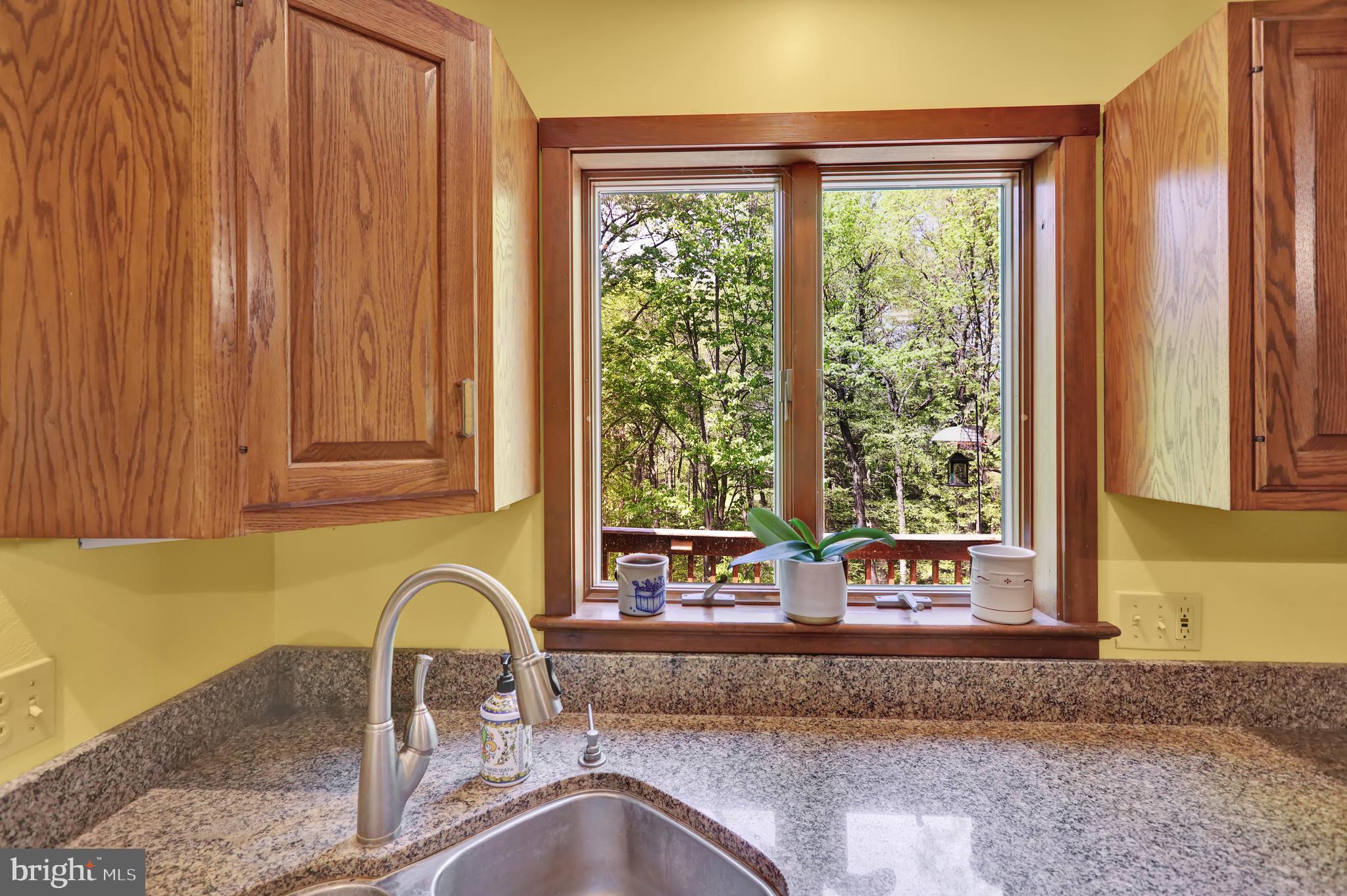 36 Wade Drive Lititz, PA 17543 - Photo 3 of 12 a kitchen with sink a window and couch