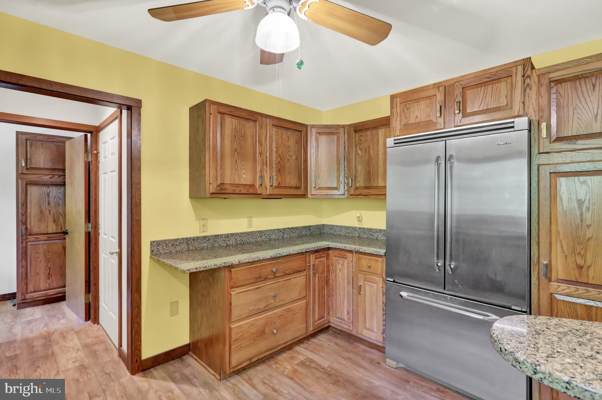36 Wade Drive Lititz, PA 17543 - Photo 4 of 12 a kitchen with a refrigerator a sink and cabinets