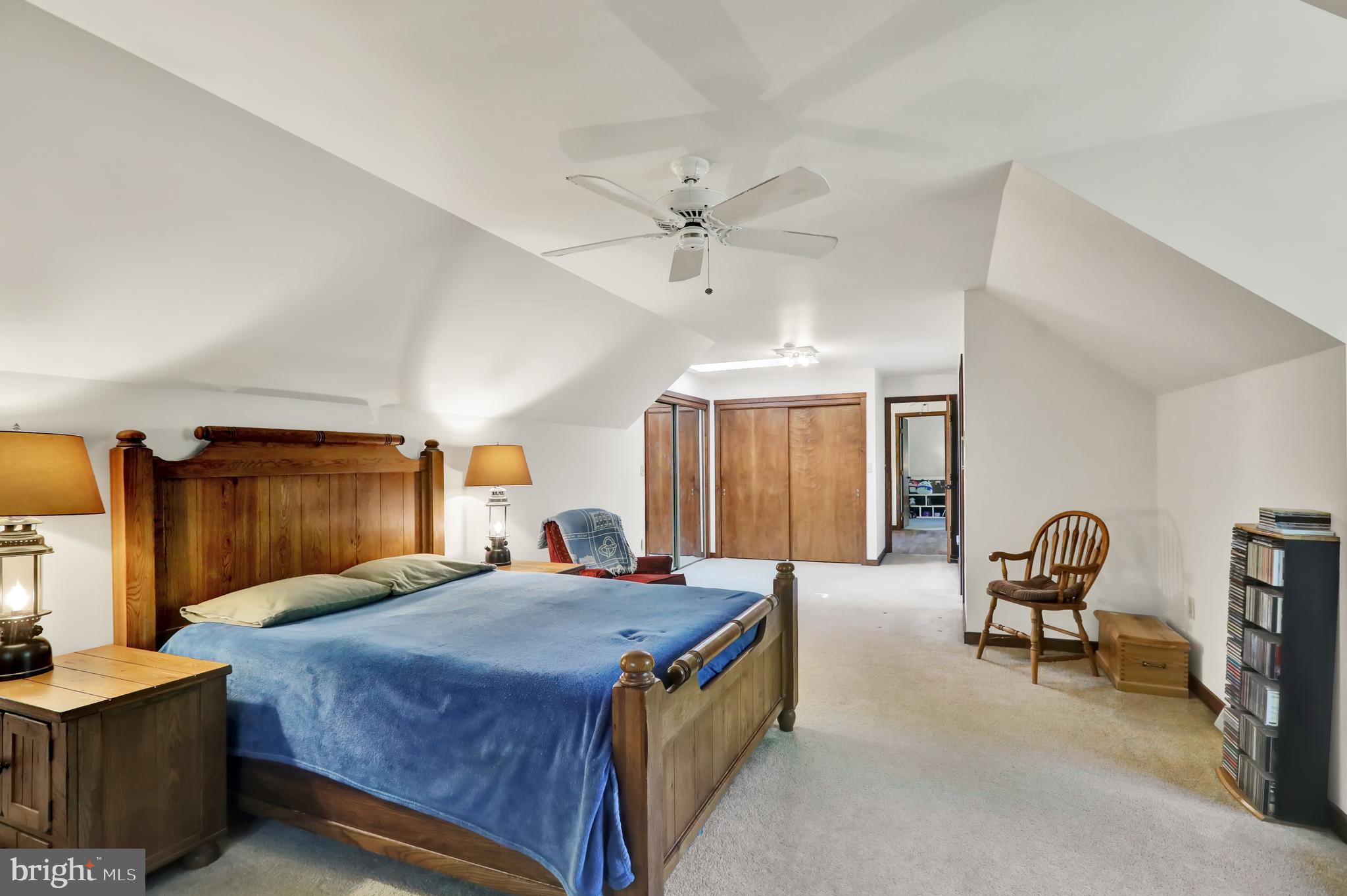 36 Wade Drive Lititz, PA 17543 - Photo 5 of 12 a bedroom with a bed and large windows