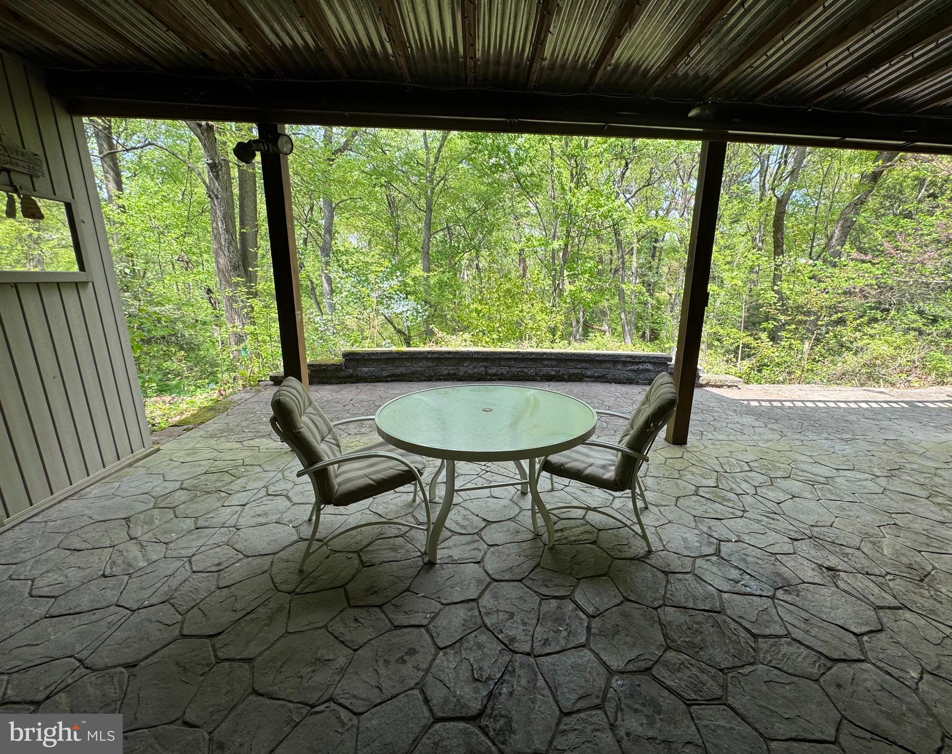 36 Wade Drive Lititz, PA 17543 - Photo 10 of 12 a view of a porch with furniture and a yard