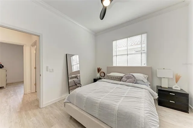 a bedroom with a bed and a closet