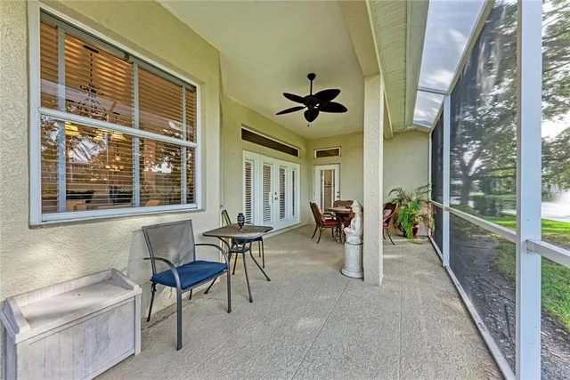 a view of a livingroom with furniture and hardwood floor